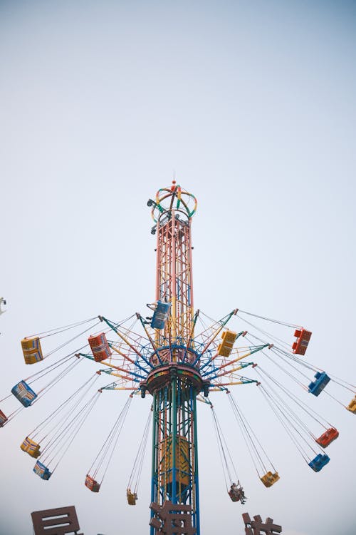 Colorful Swing Carousel Ride at Amusement Park · Free Stock Photo