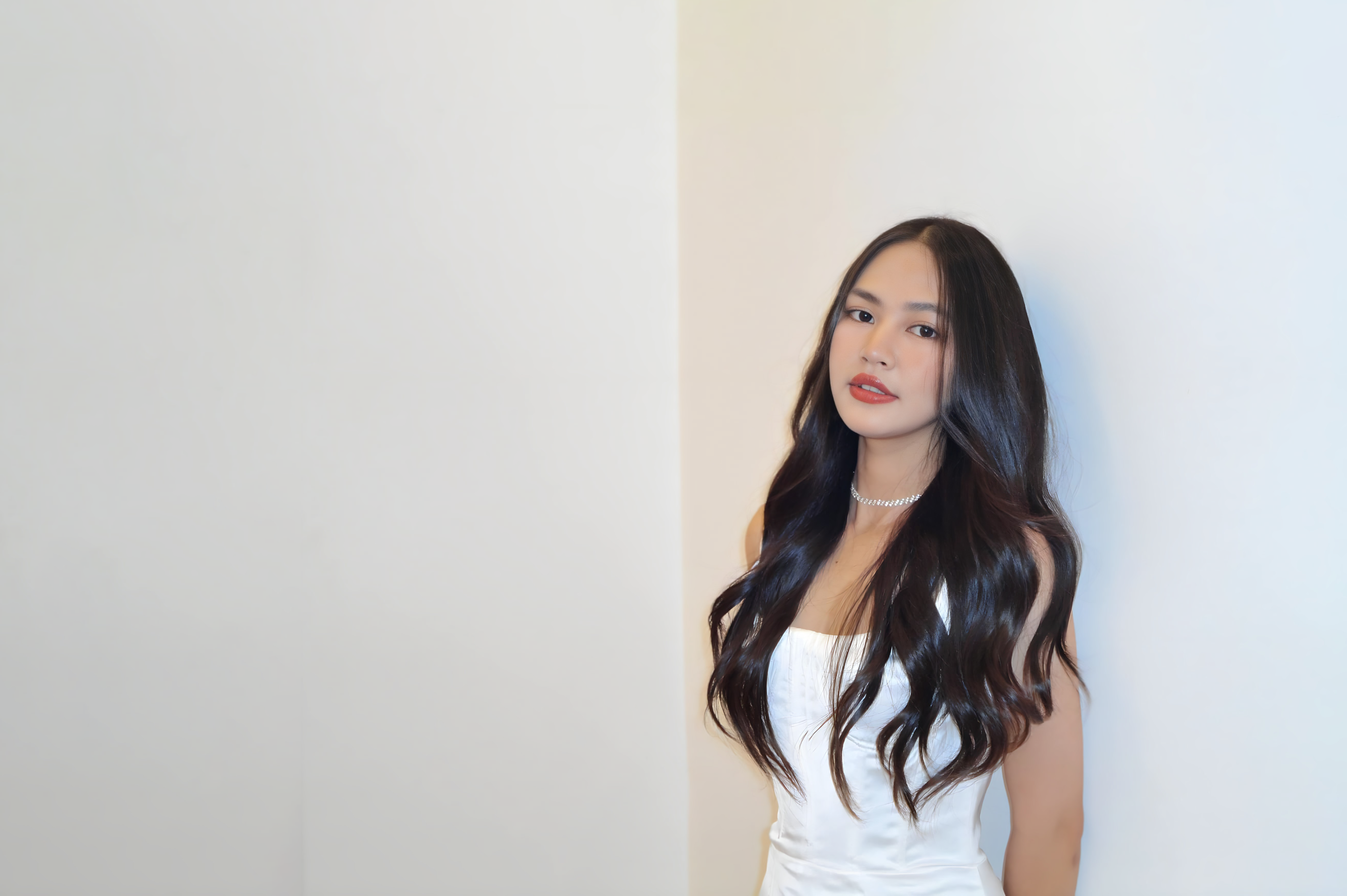 Elegant Woman in White Dress with Long Hair · Free Stock Photo