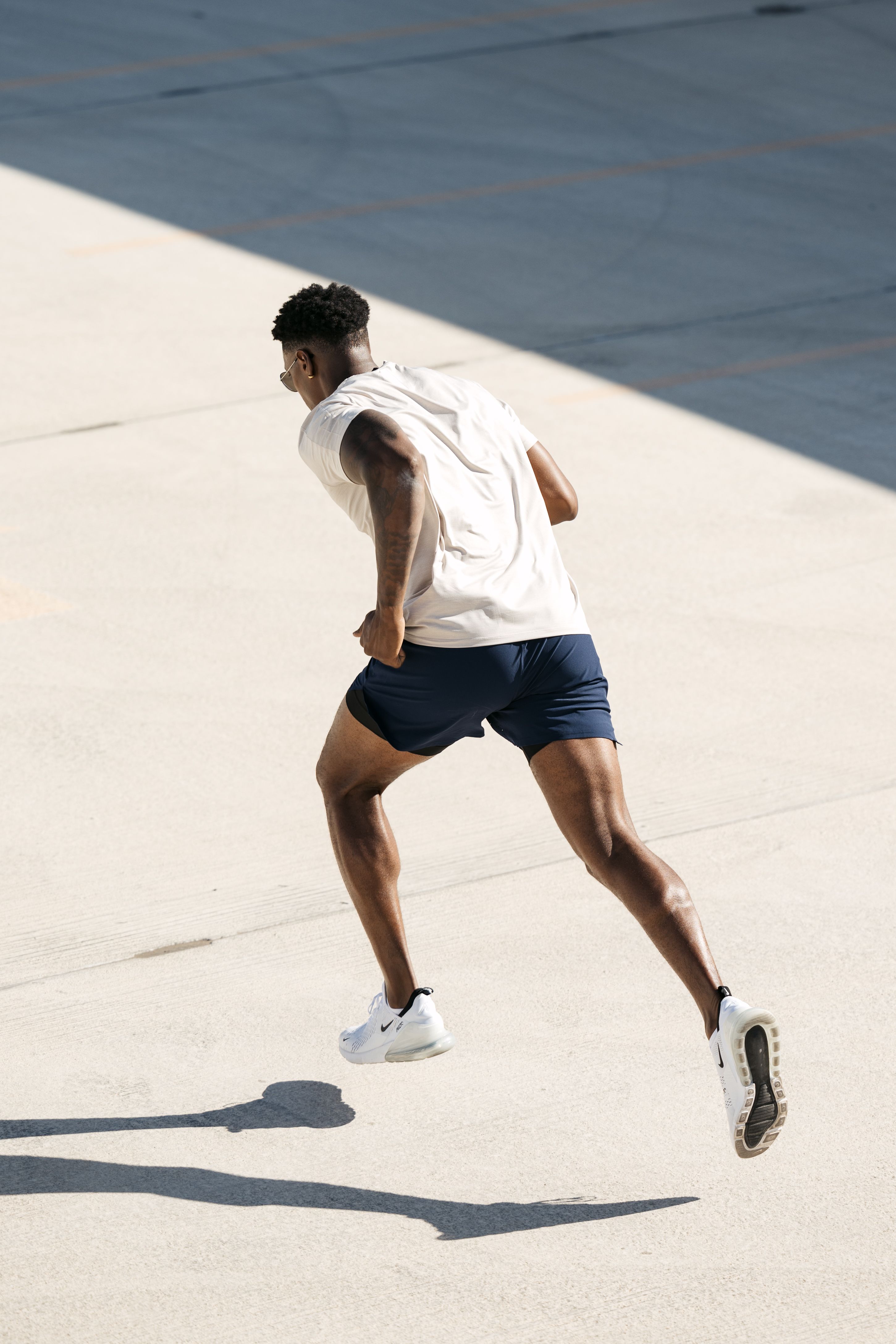 Athletic Runner on Rooftop in Austin · Free Stock Photo