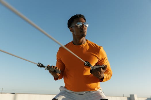 Dynamic photo of a man exercising on a rooftop in Austin, Texas, embodying urban fitness and style.