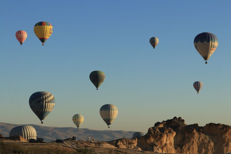 Hot air balloons floating over Cappadocia at sunrise, Turkey