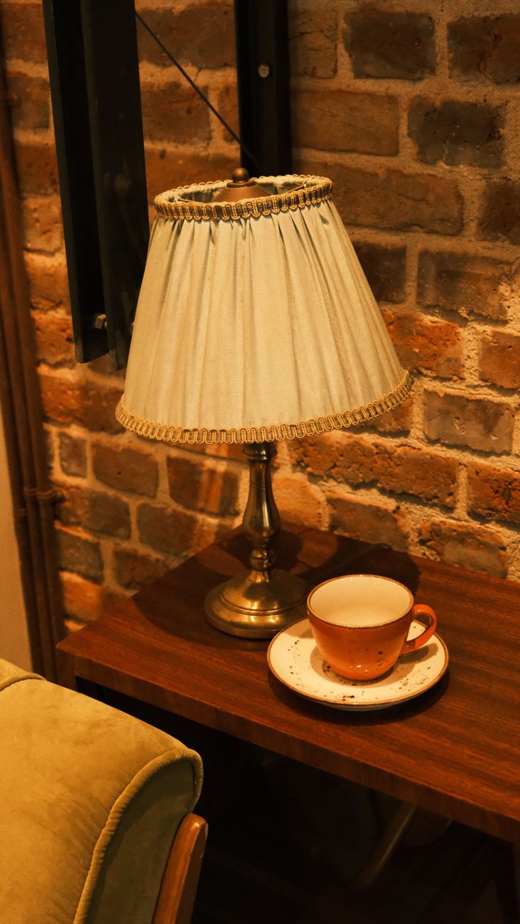 warm lamp glow in a cozy corner
