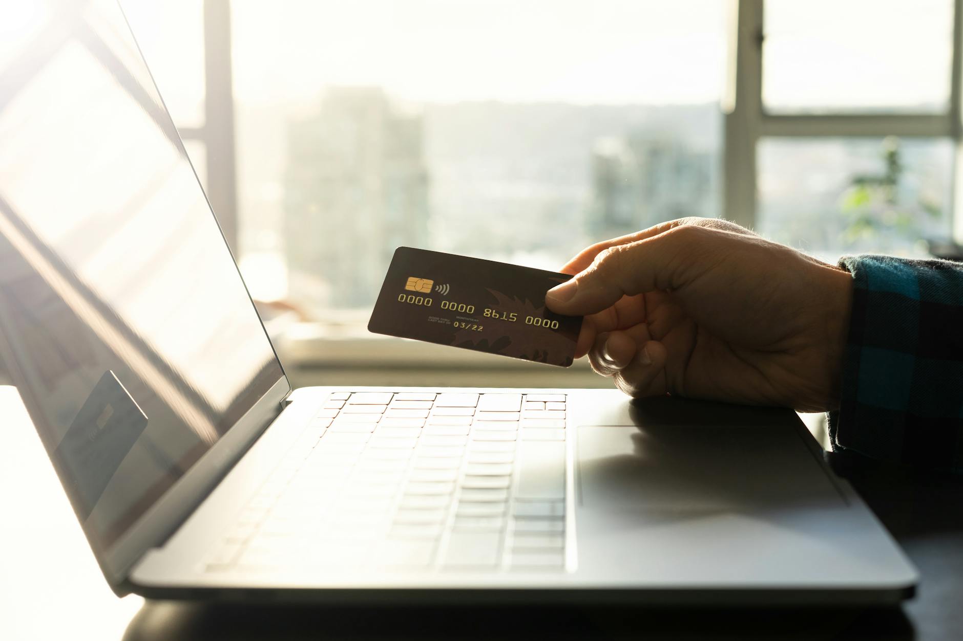 https://www.pexels.com/photo/online-shopping-with-credit-card-and-laptop-29205862/