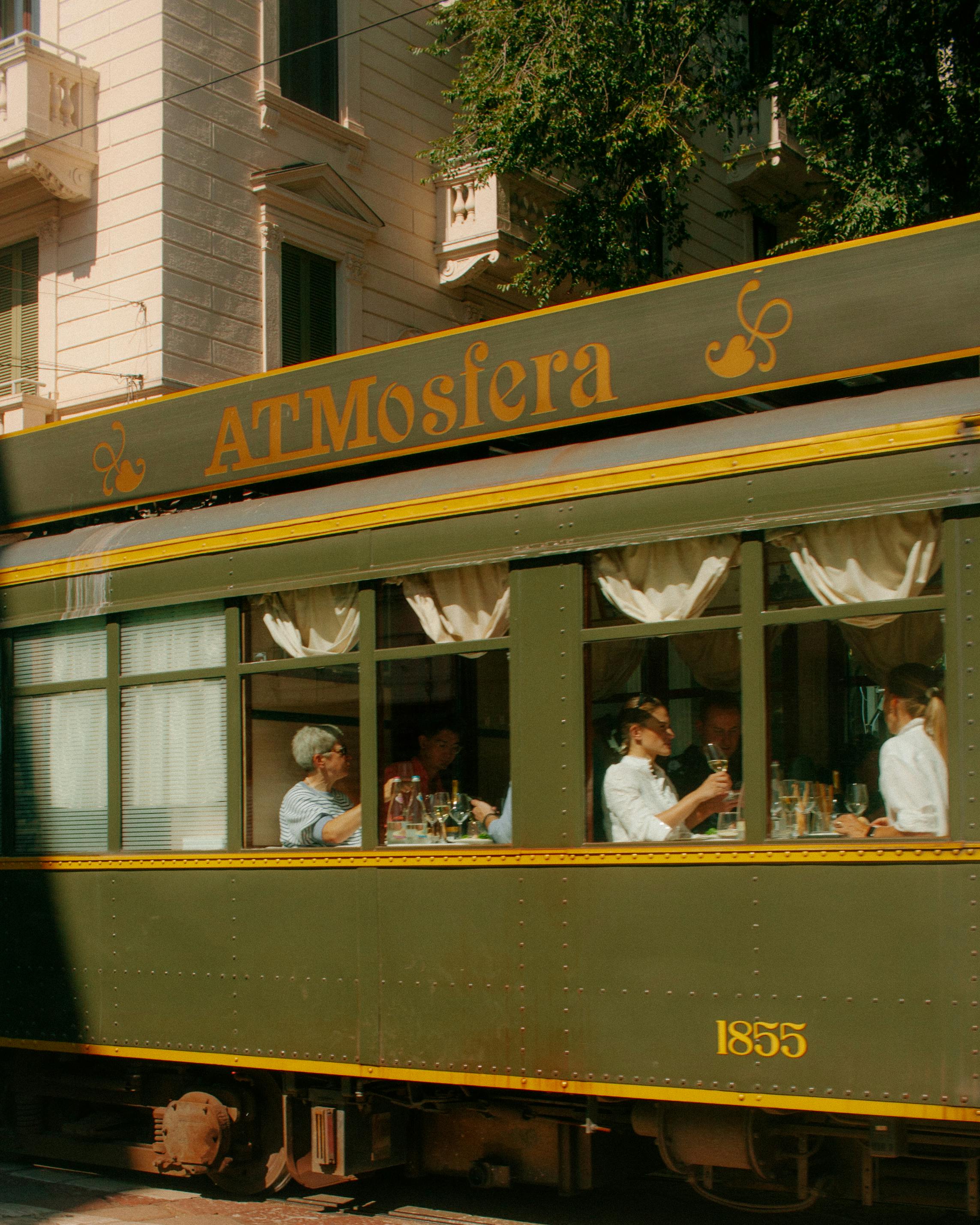 ATMosfera tram restaurant in Milan offering a unique dining experience in a vintage setting.