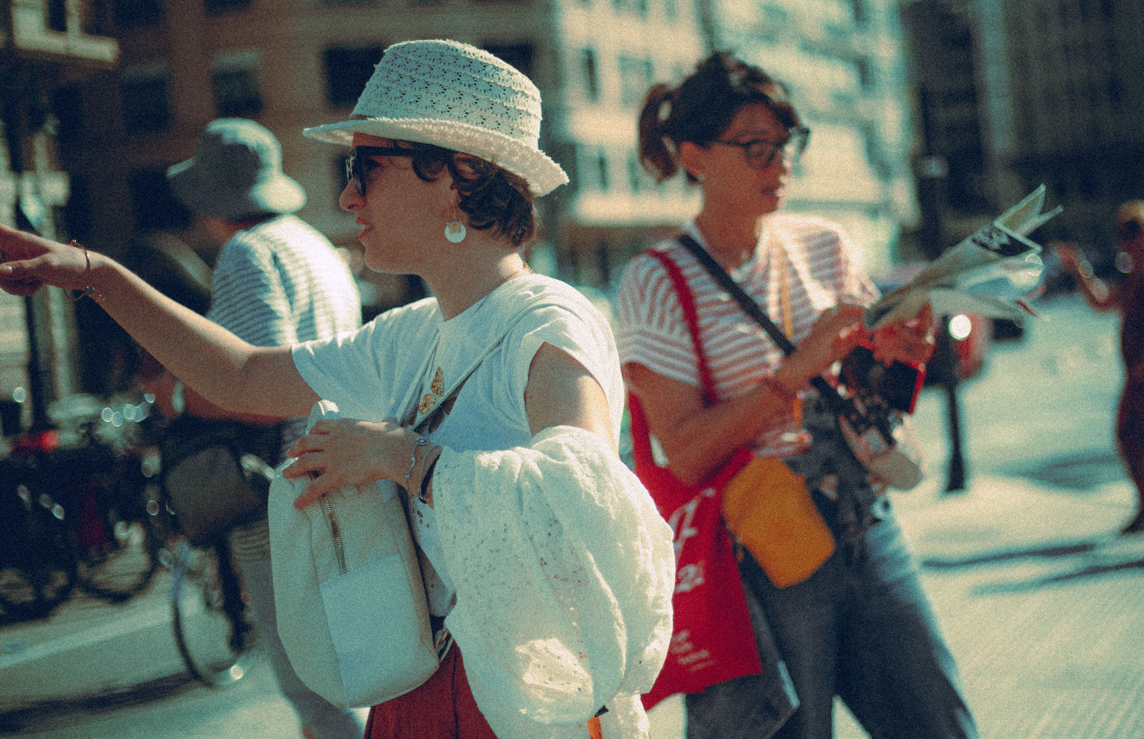 Two Stylish Women Exploring a Vibrant City · Free Stock Photo