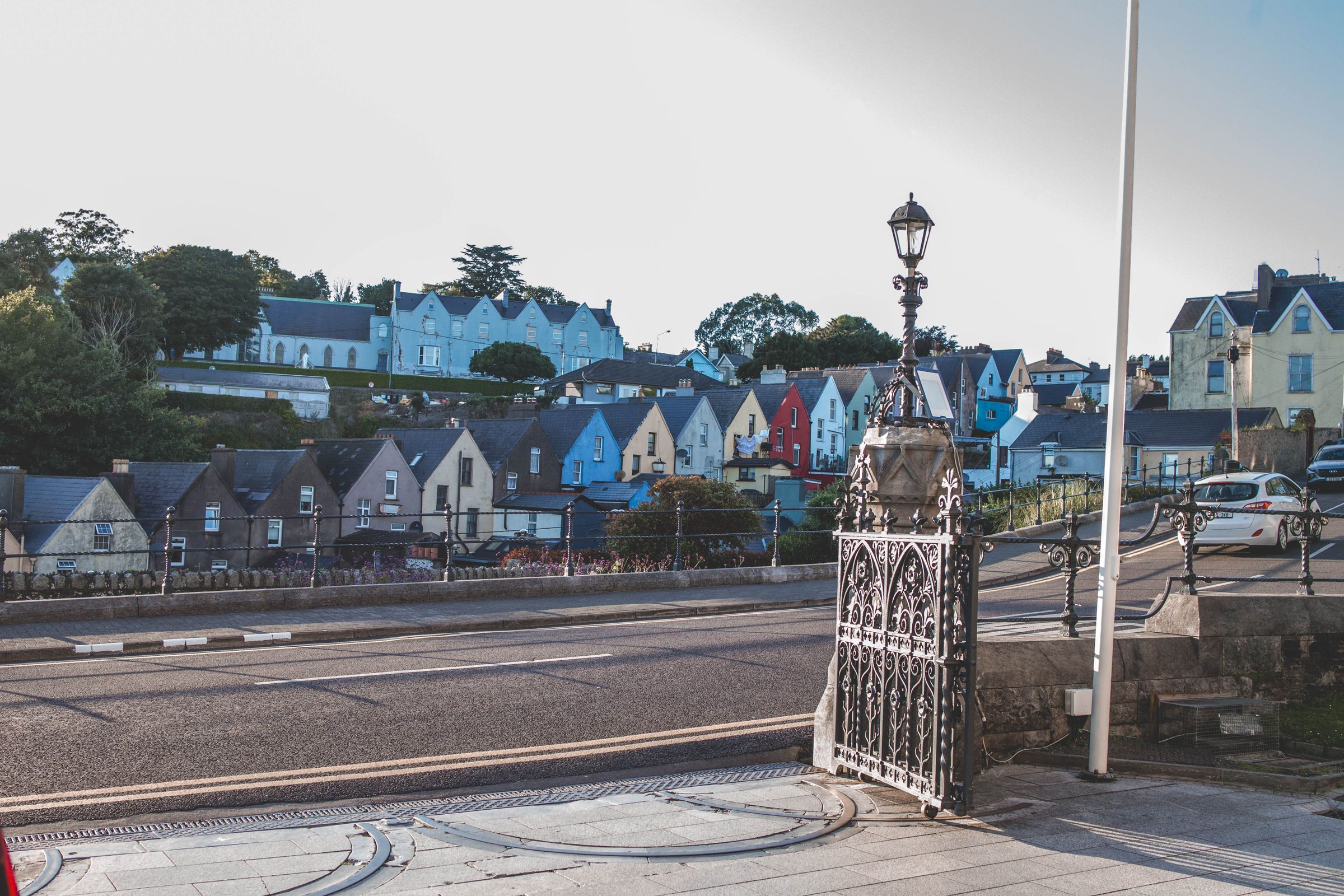Street view of houses in Cobh, Ireland, showcasing traditional architecture