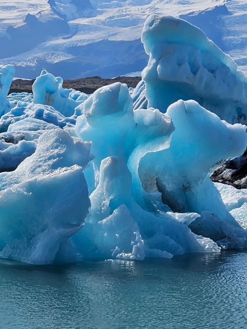Free Majestic blue icebergs at Jökulsárlón Glacier Lagoon, Iceland, showcasing nature's beauty. Stock Photo