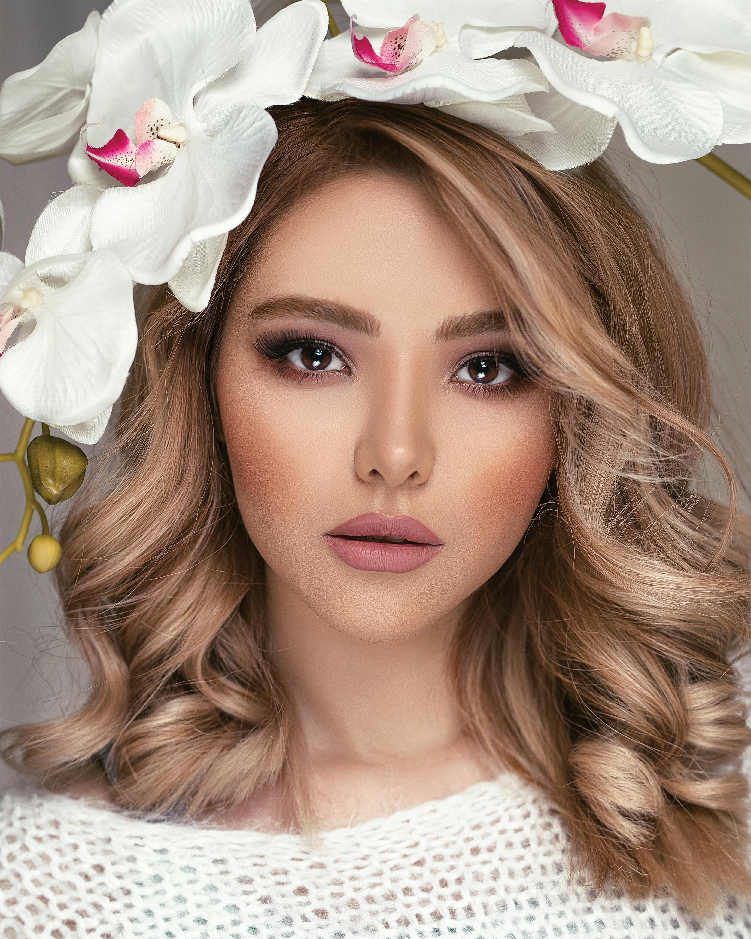 portrait photo of woman wearing flower crown