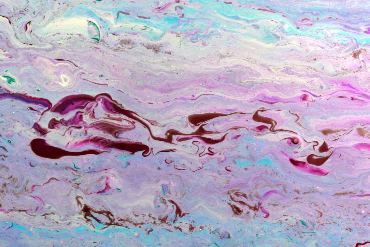 vibrant abstract liquid art piece with swirling pastel colors creating