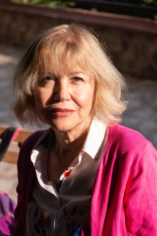 Free Elegant portrait of a senior woman enjoying a sunny day in Izmir, Turkey. Stock Photo