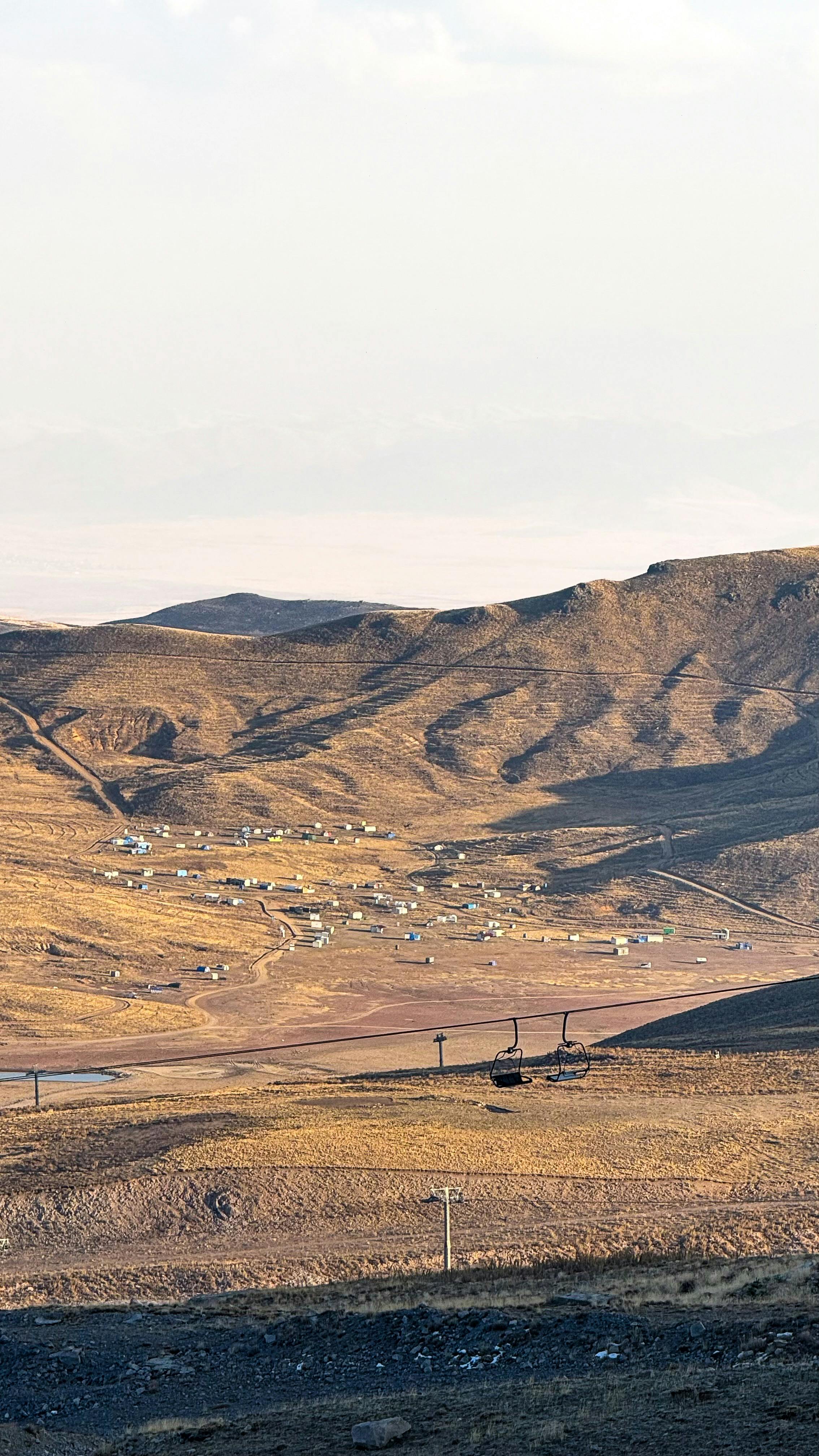 Prescription Goggle Inserts - Beautiful winter landscape of Erciyes Mountain with scattered village houses and ski lifts.