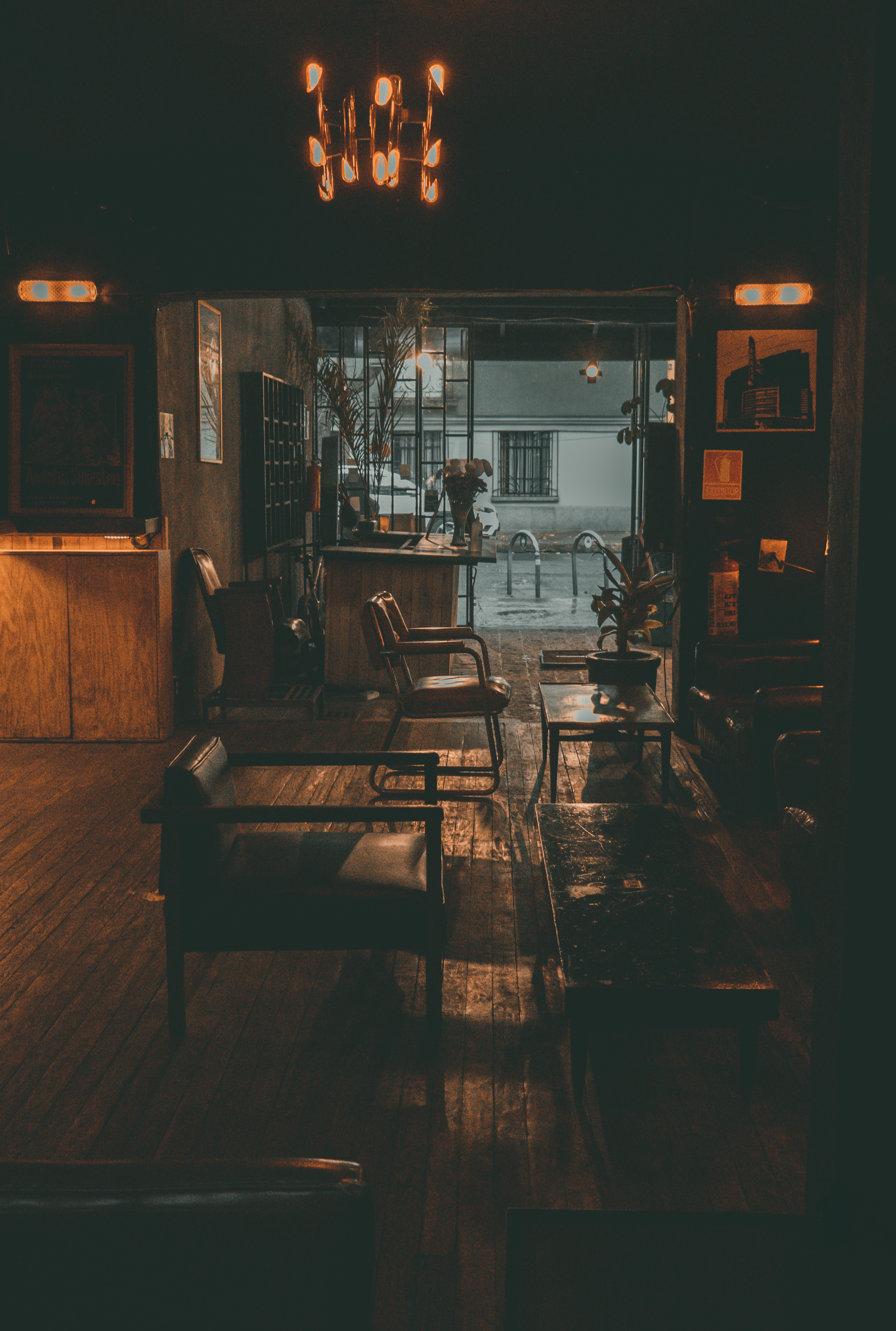 Cozy Vintage Cafe Interior with Dim Lighting · Free Stock Photo