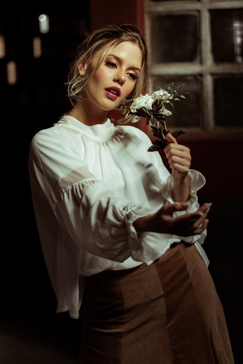 Woman Wearing A White Blouse 