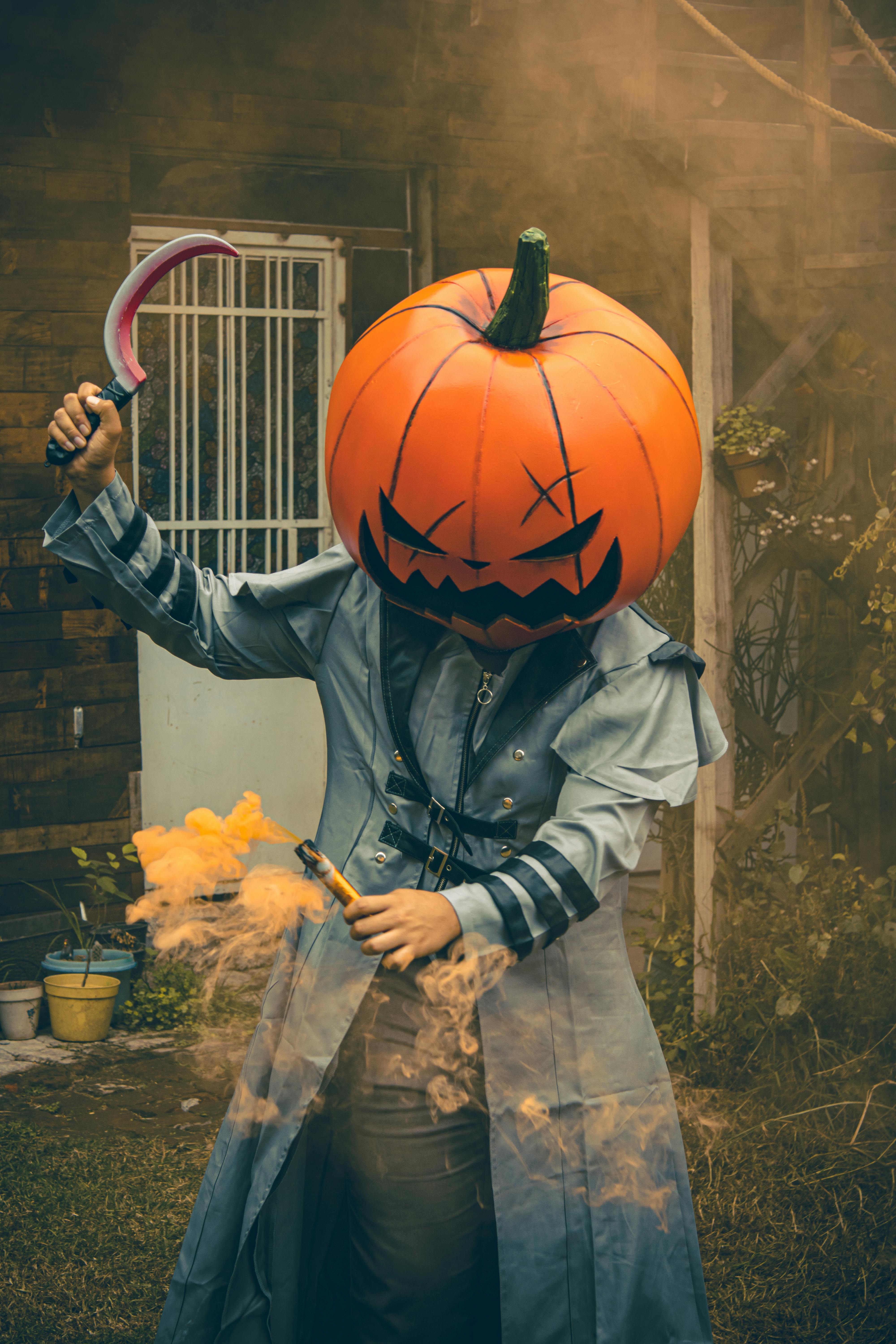 Halloween Pumpkin Head Costume with Smoke Free Stock Photo