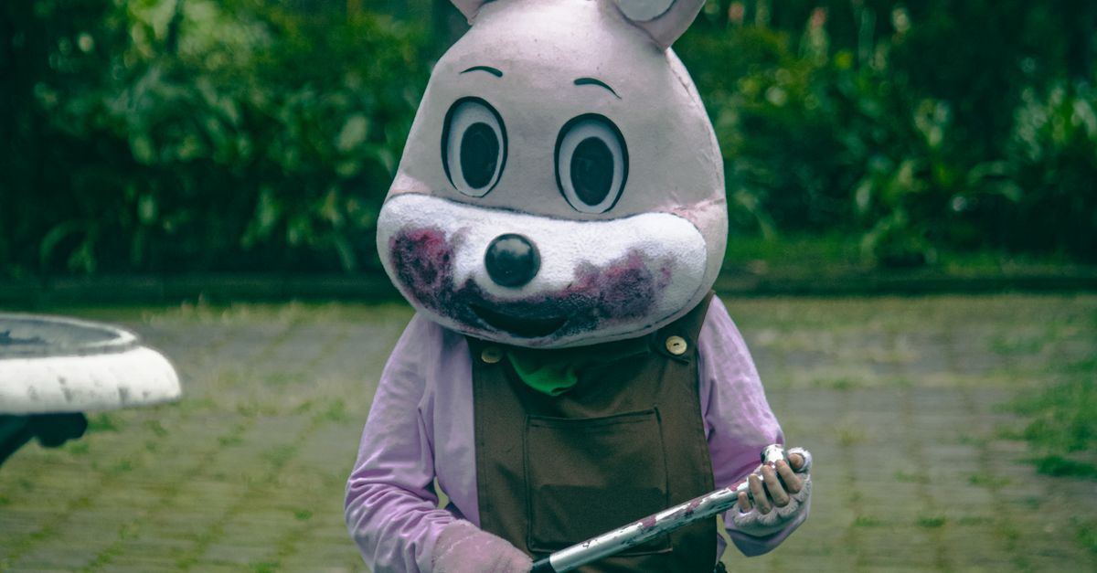 Creepy Rabbit Show Creepy Rabbit Costume in Park Setting · Free Stock Photo