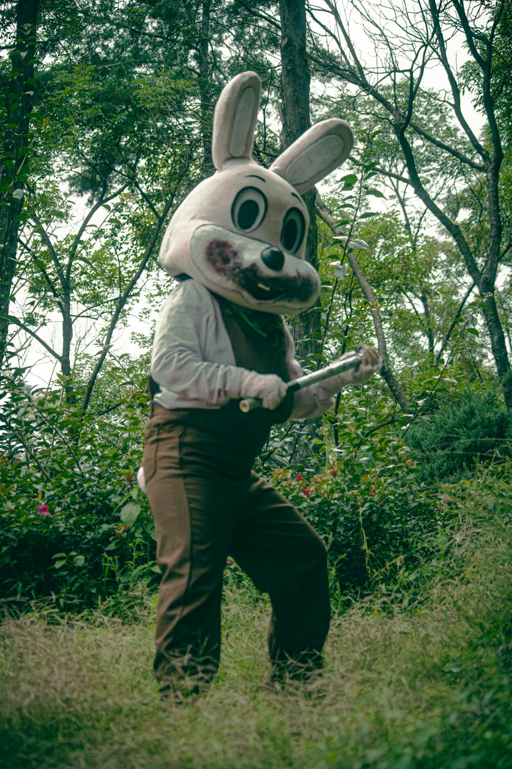 Scary Rabbit Costume in Forest Setting ยท Free Stock Photo