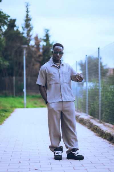 Man in a relaxed sand-coloured co-ord set — photo by El gringo photo on Pexels