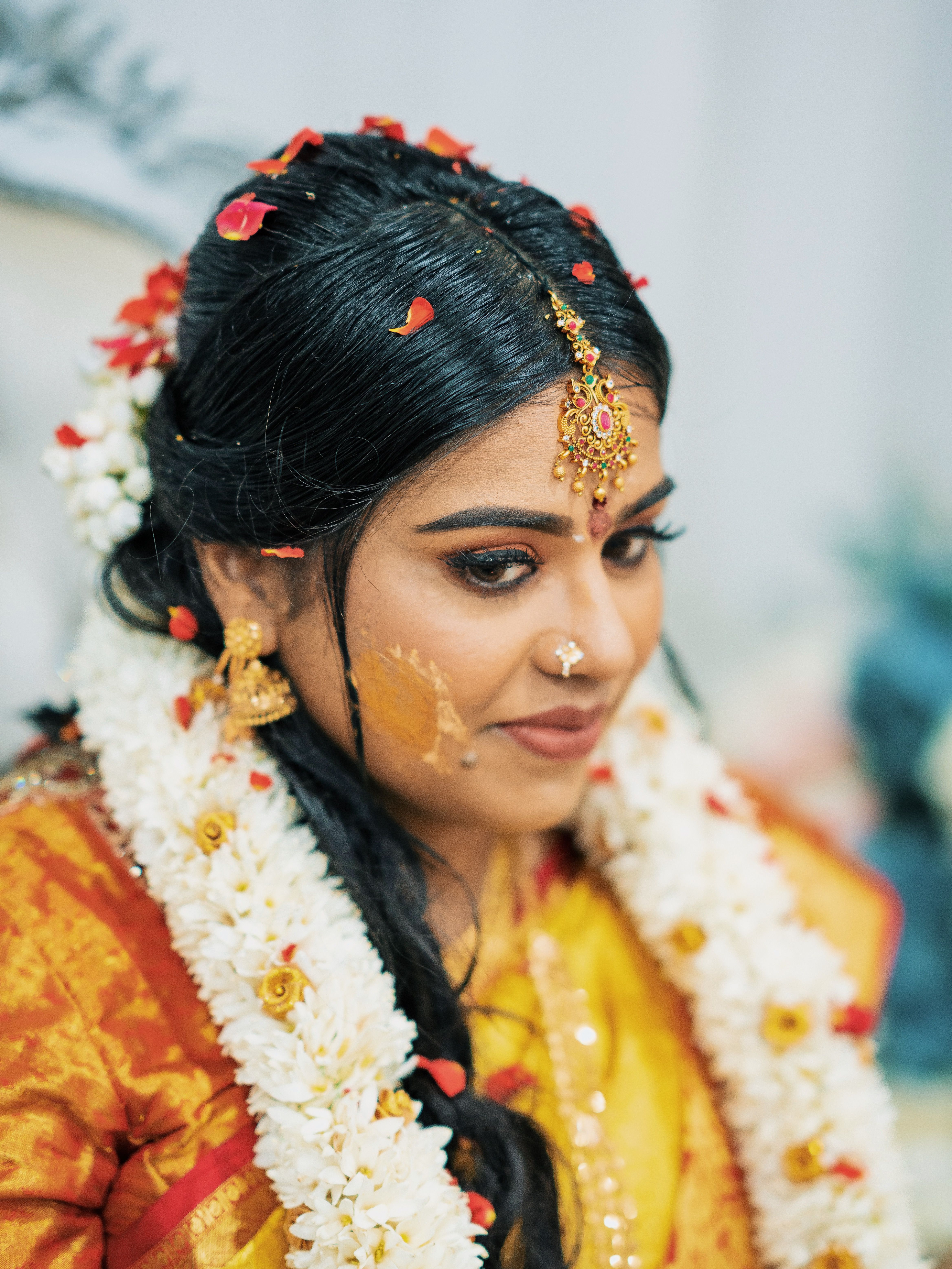 Bride during a traditional haldi ceremony