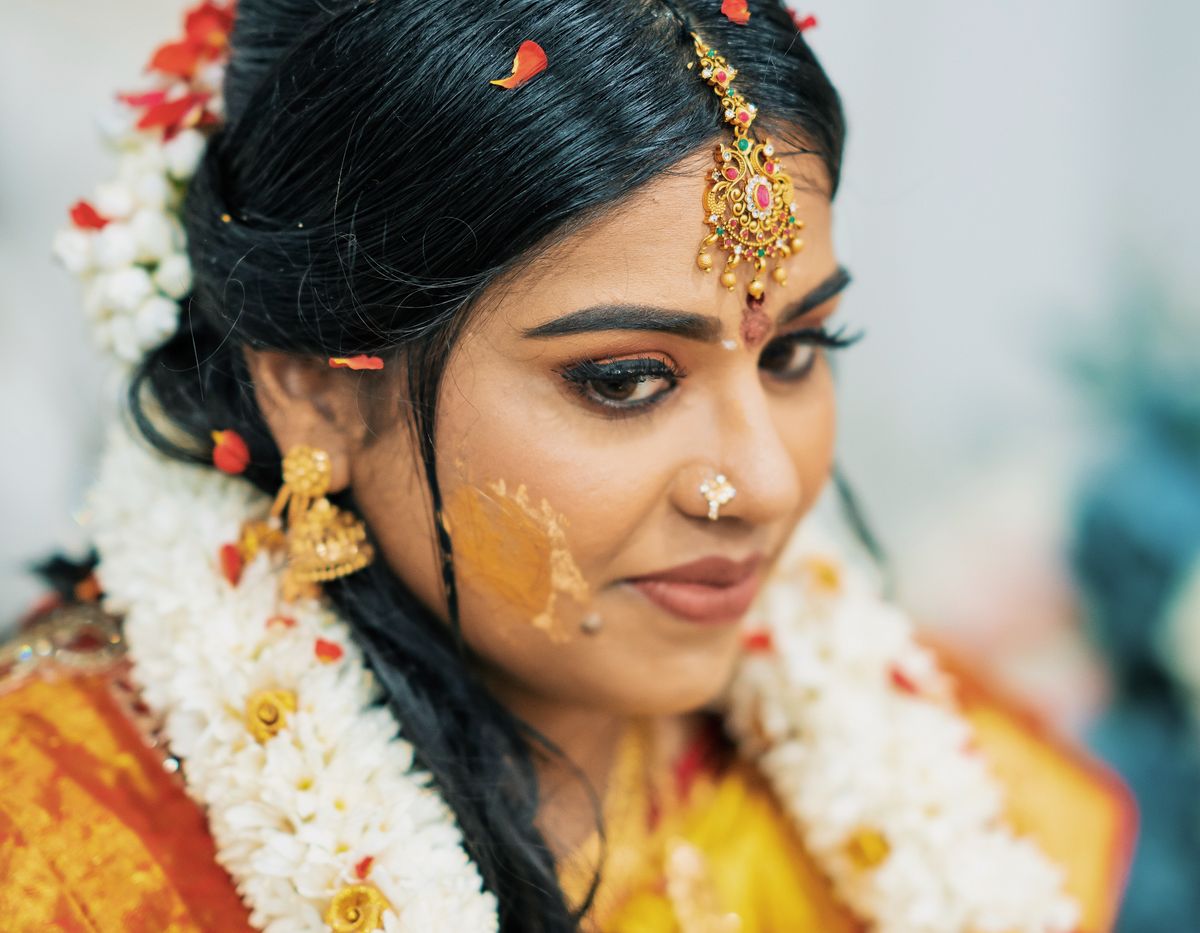 Bride during a traditional haldi ceremony