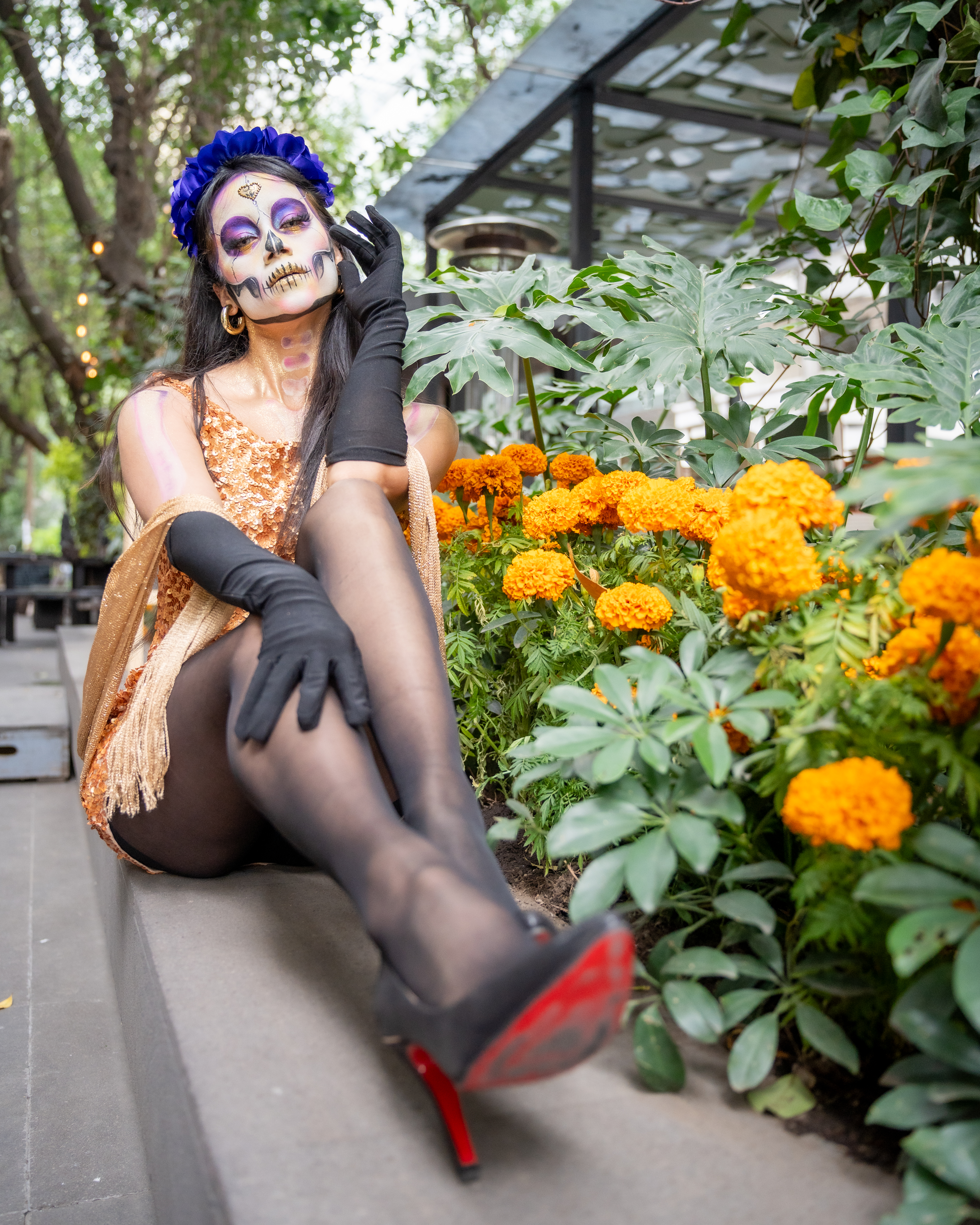 elegant catrina costume in mexico city garden