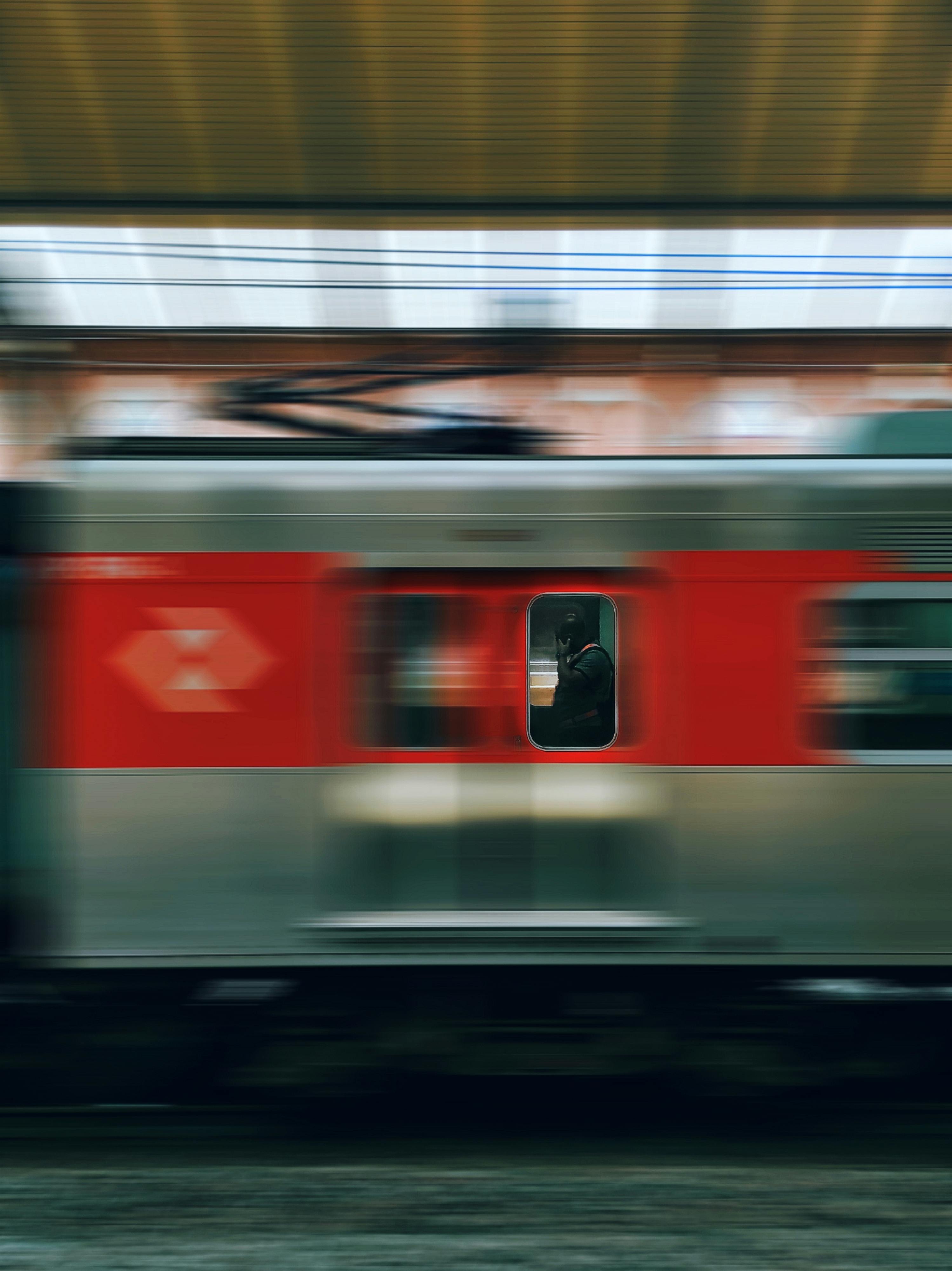 Dynamic photo of a train passing in São Paulo, capturing urban motion.