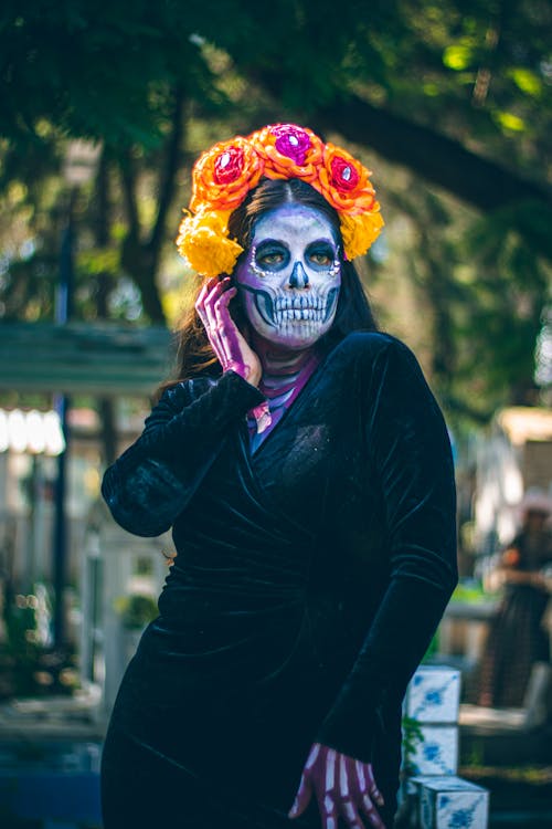 Free Vibrant portrait of a woman in Day of the Dead makeup, Mexico City. Stock Photo