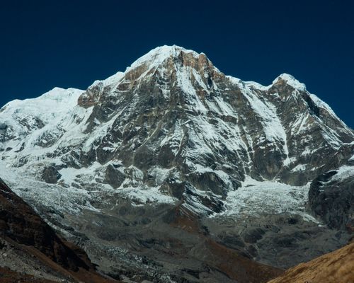 Arid trans-Himalayan ridgelines under a clear sky