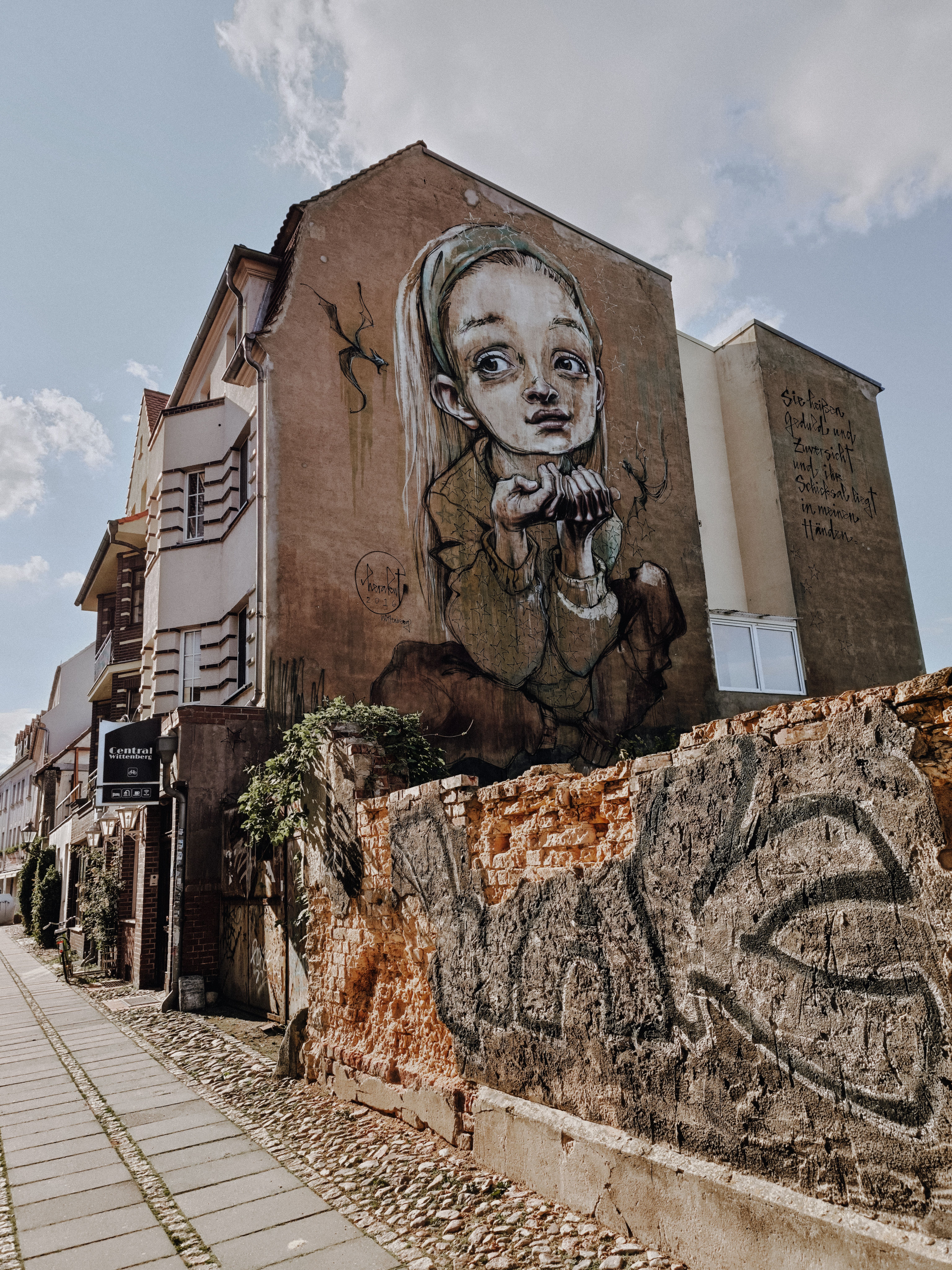Urban Street Art on Abandoned Building Wall · Free Stock Photo