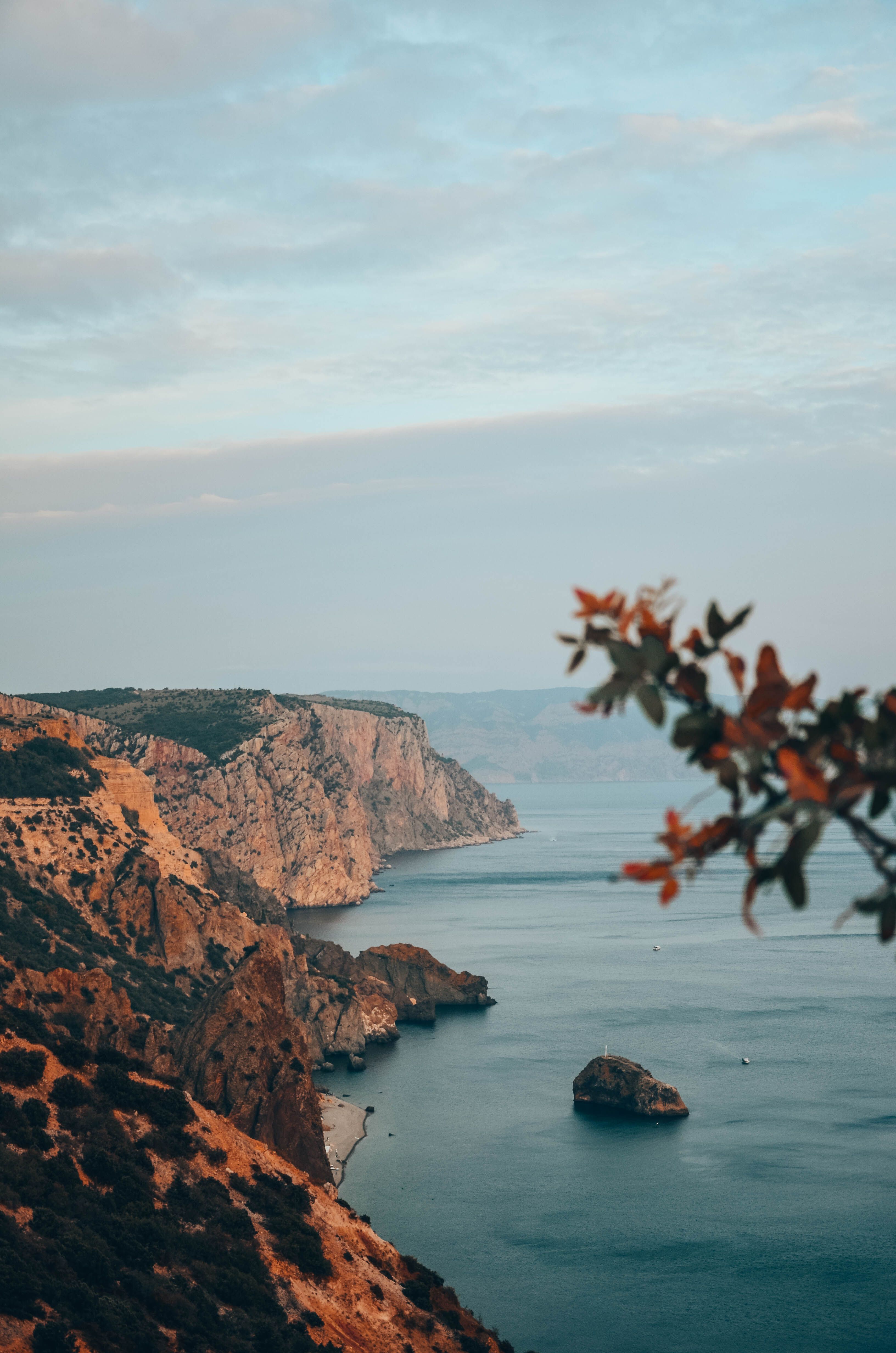 Scenic Coastal Cliffside Overlooking Calm Ocean · Free Stock Photo