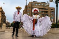 A couple dressed in Catrina costumes for Day of the Dead celebration in Mexico.
