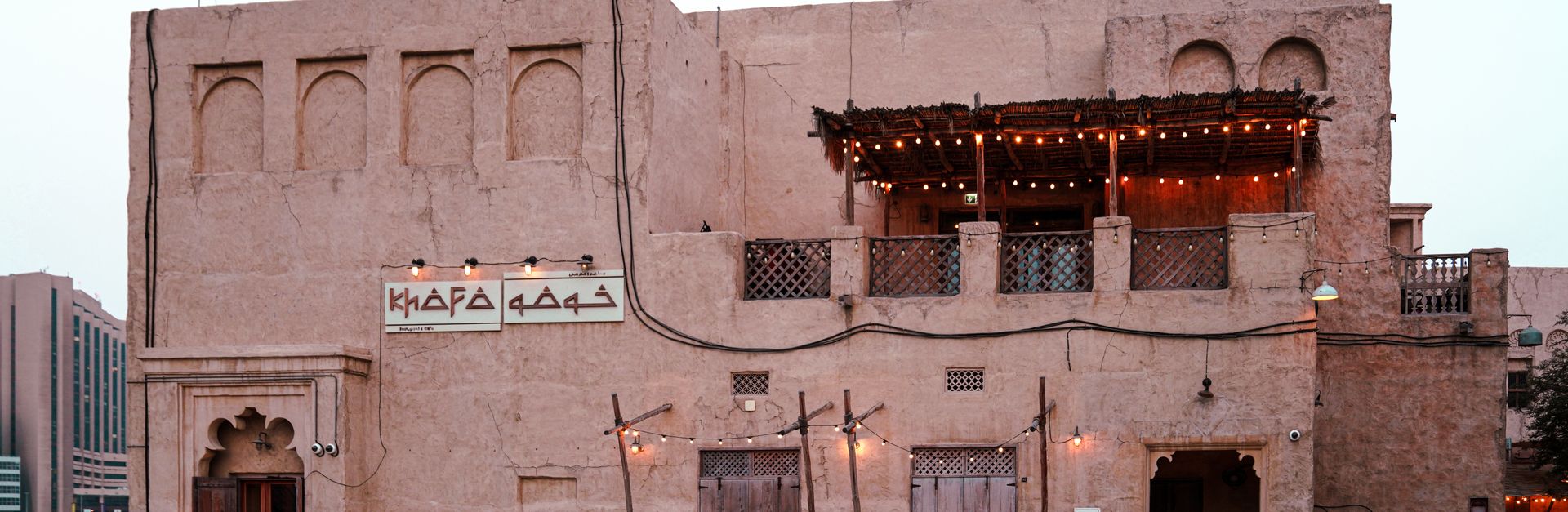Charming view of old Dubai architecture with rustic textures and ambient lighting