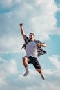 Low Angle Photography of Man Jumping