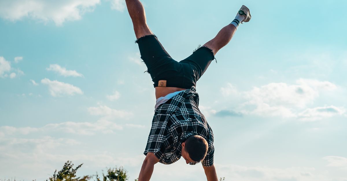 Men Balancing Man Balancing on Stones · Free Stock Photo