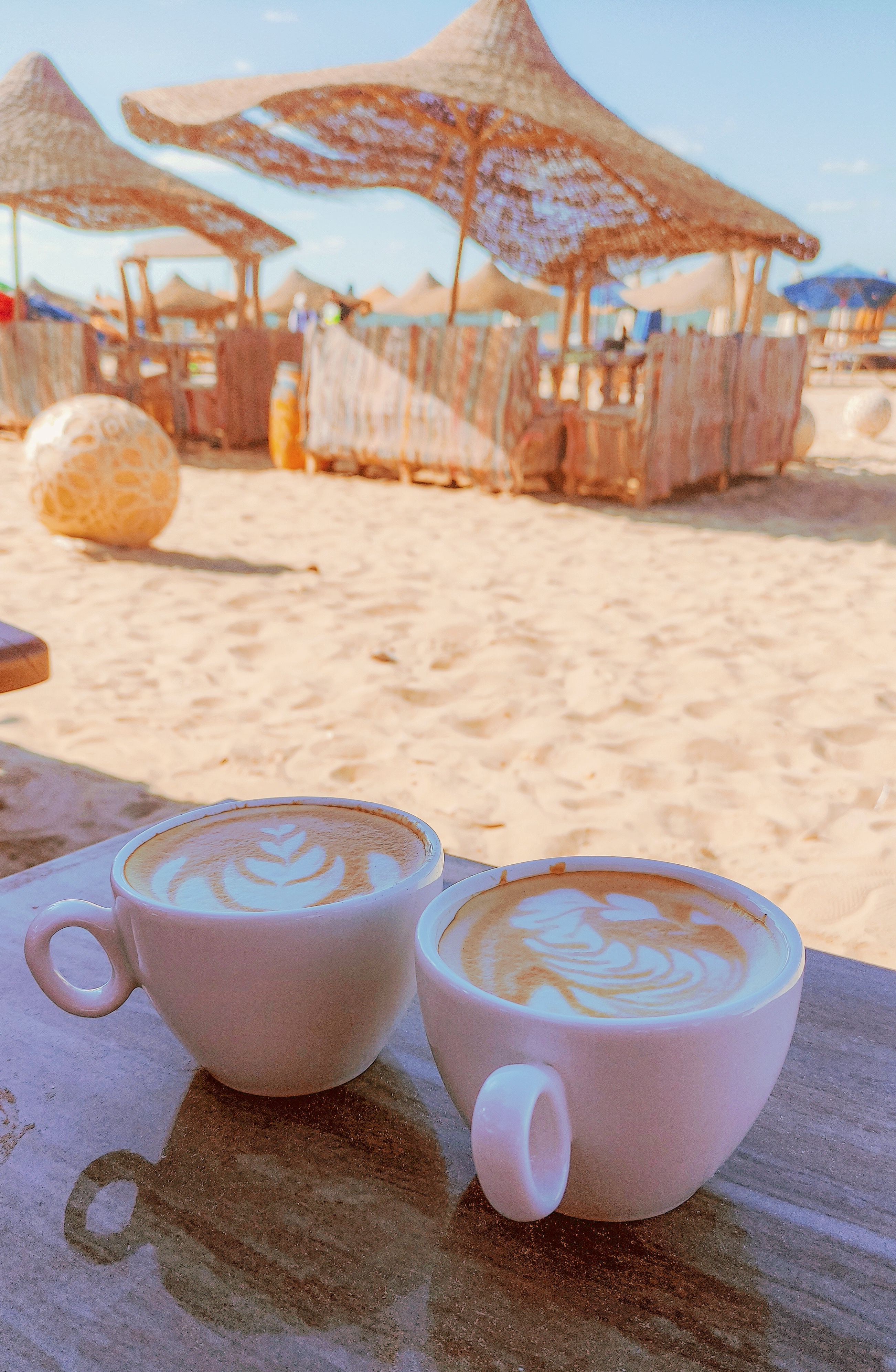 Ceramic Coffee Cups on Sunny Egyptian Beach  Free Stock Photo