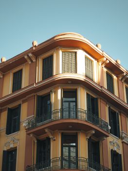 Corner view of a historic building with Art Deco architecture under clear skies.. pexels, corner, view