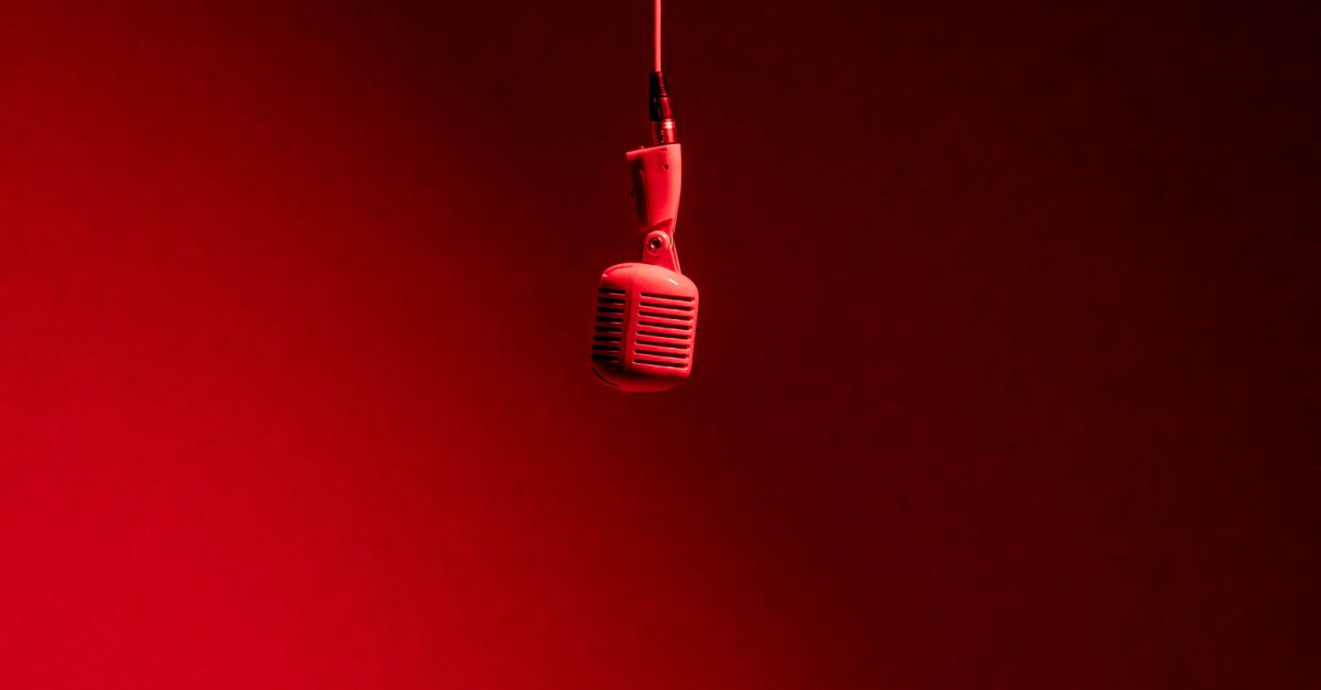 Microphone Computer Red Minimalist Red Microphone on Stage in Toronto · Free Stock Photo