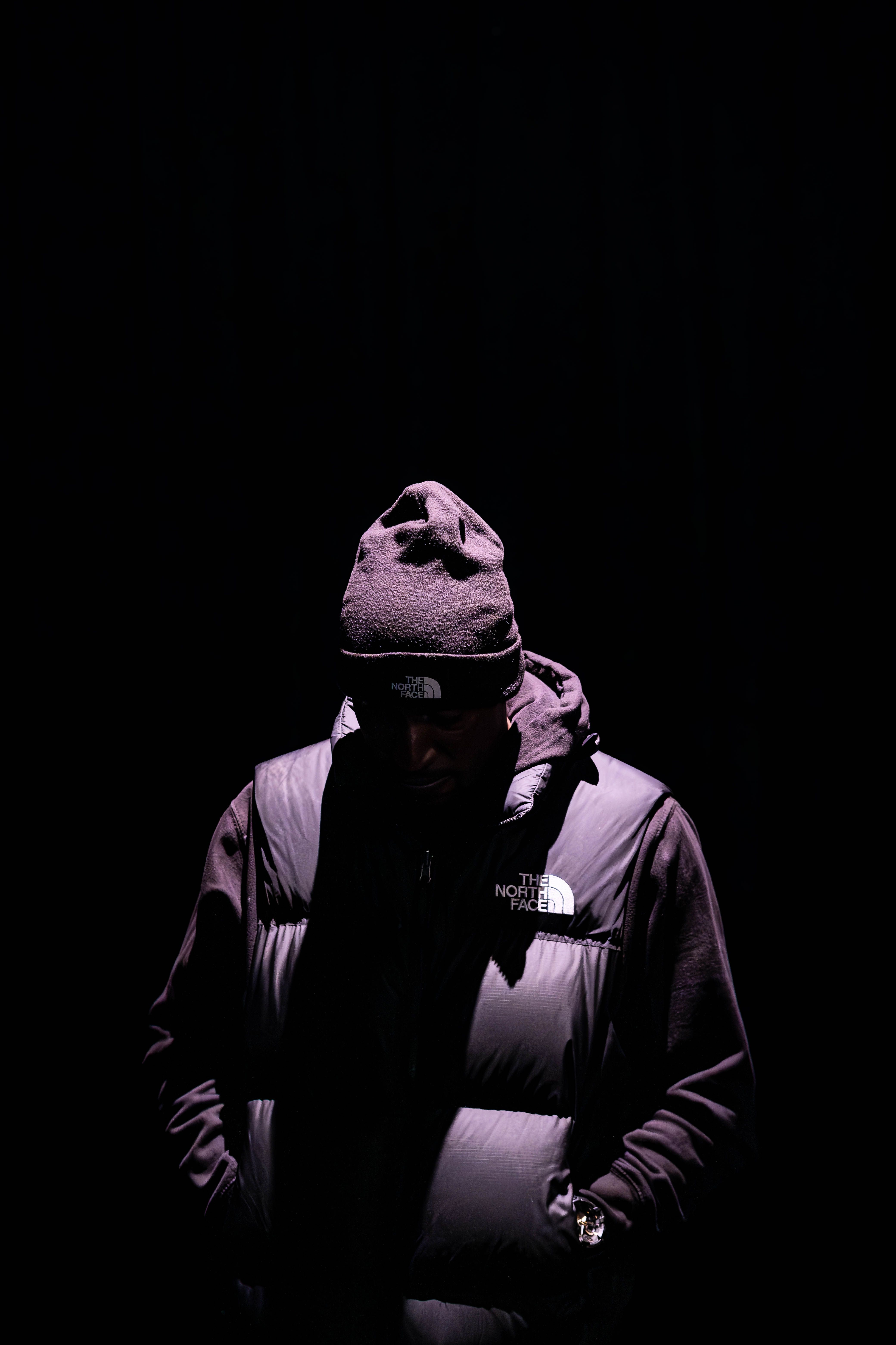 Moody Portrait in Dark Urban Setting