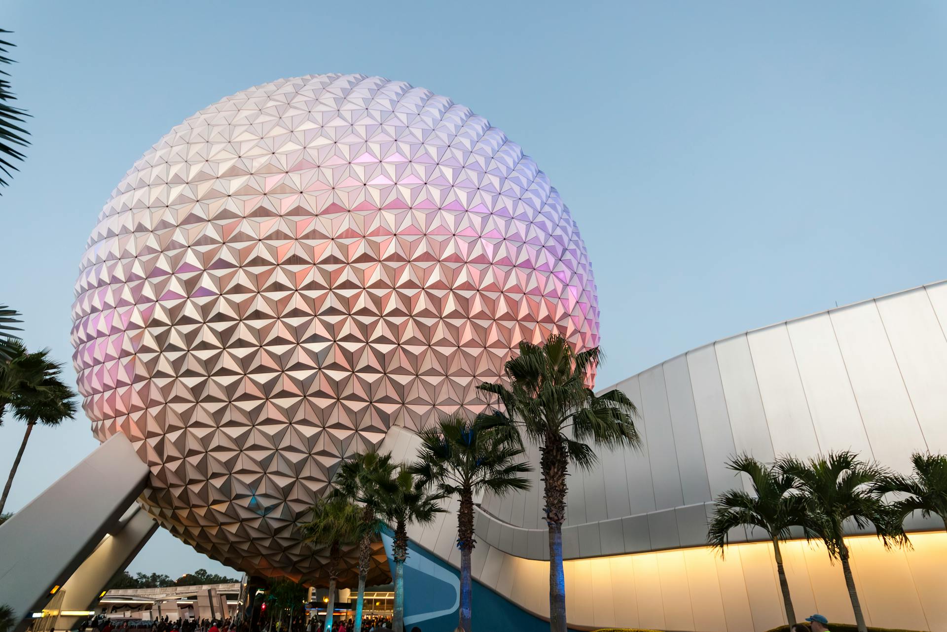 Iconic geodesic sphere, Spaceship Earth, at Epcot Center against a clear sky.