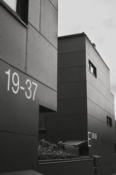 Black and white image of modern buildings in Copenhagen, highlighting urban architecture.