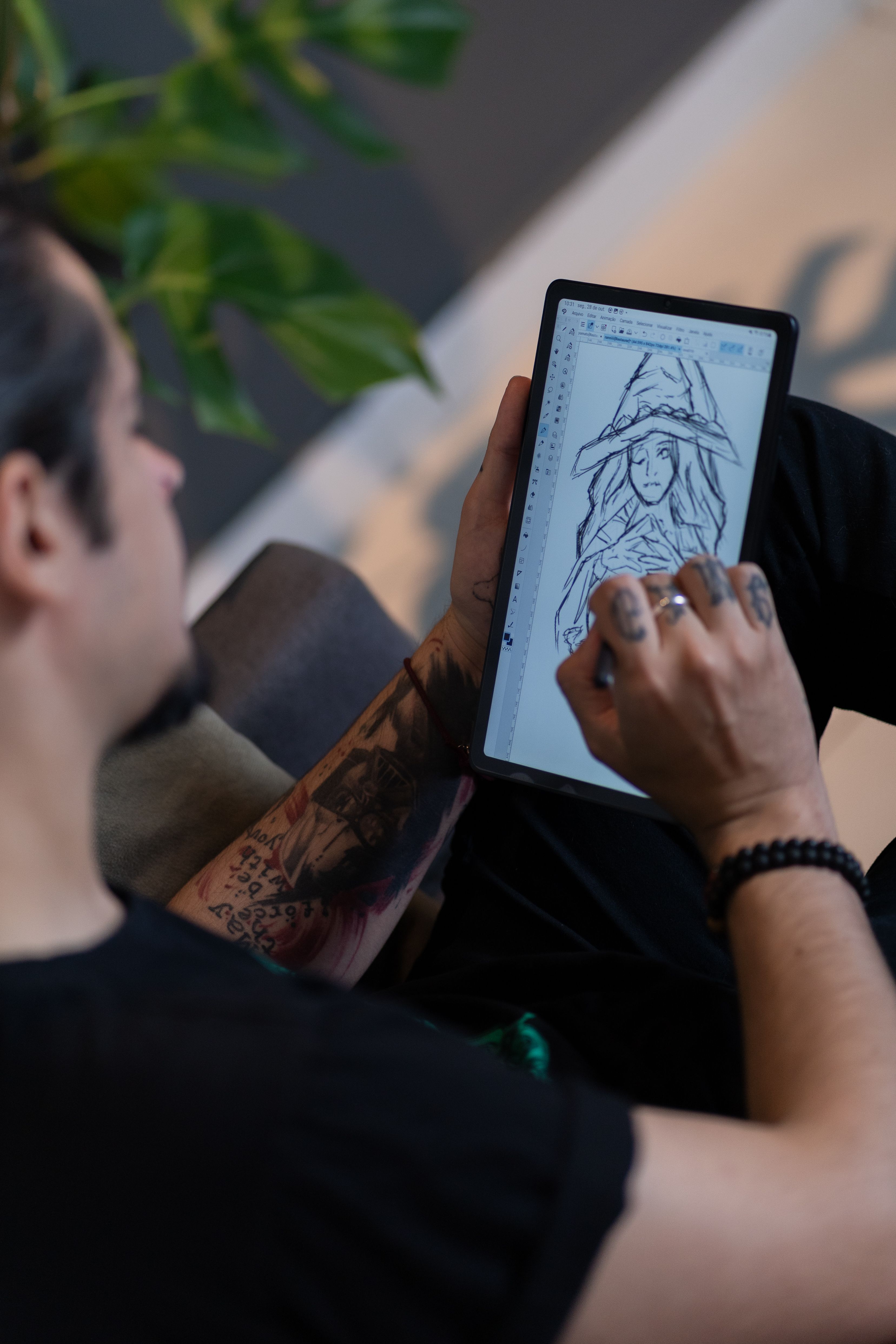 Artist creating a digital illustration on a tablet