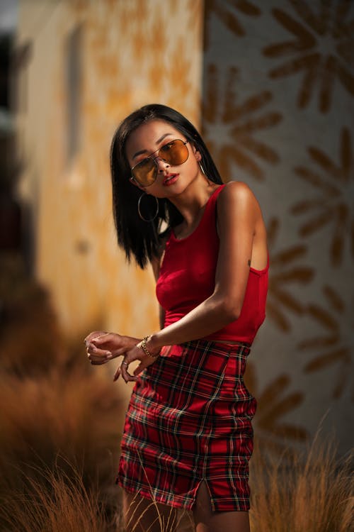 Free Woman Wearing red Halter Top and Checkered Skirt Stock Photo