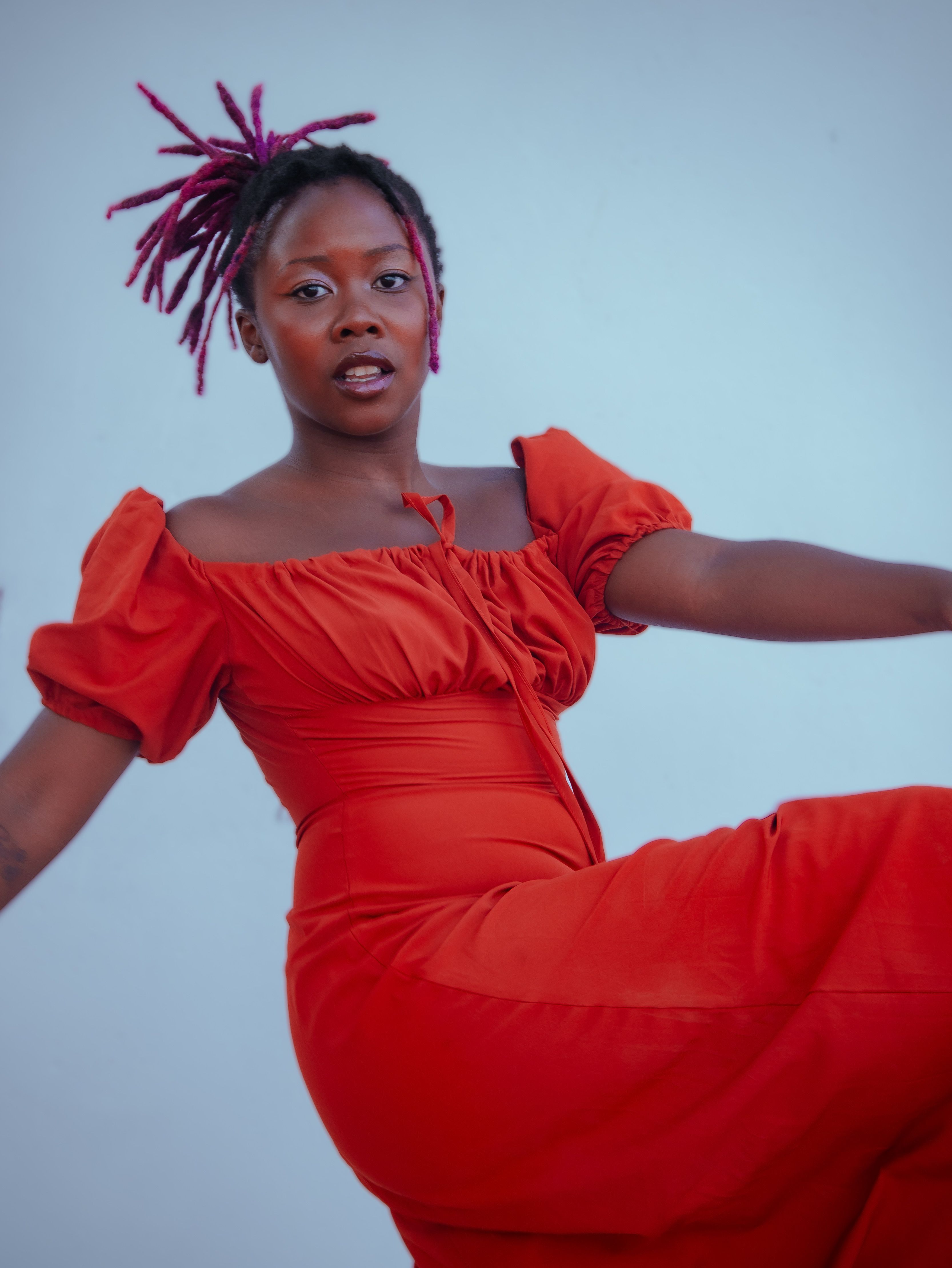 Expressive Dance Portrait in Red Dress · Free Stock Photo
