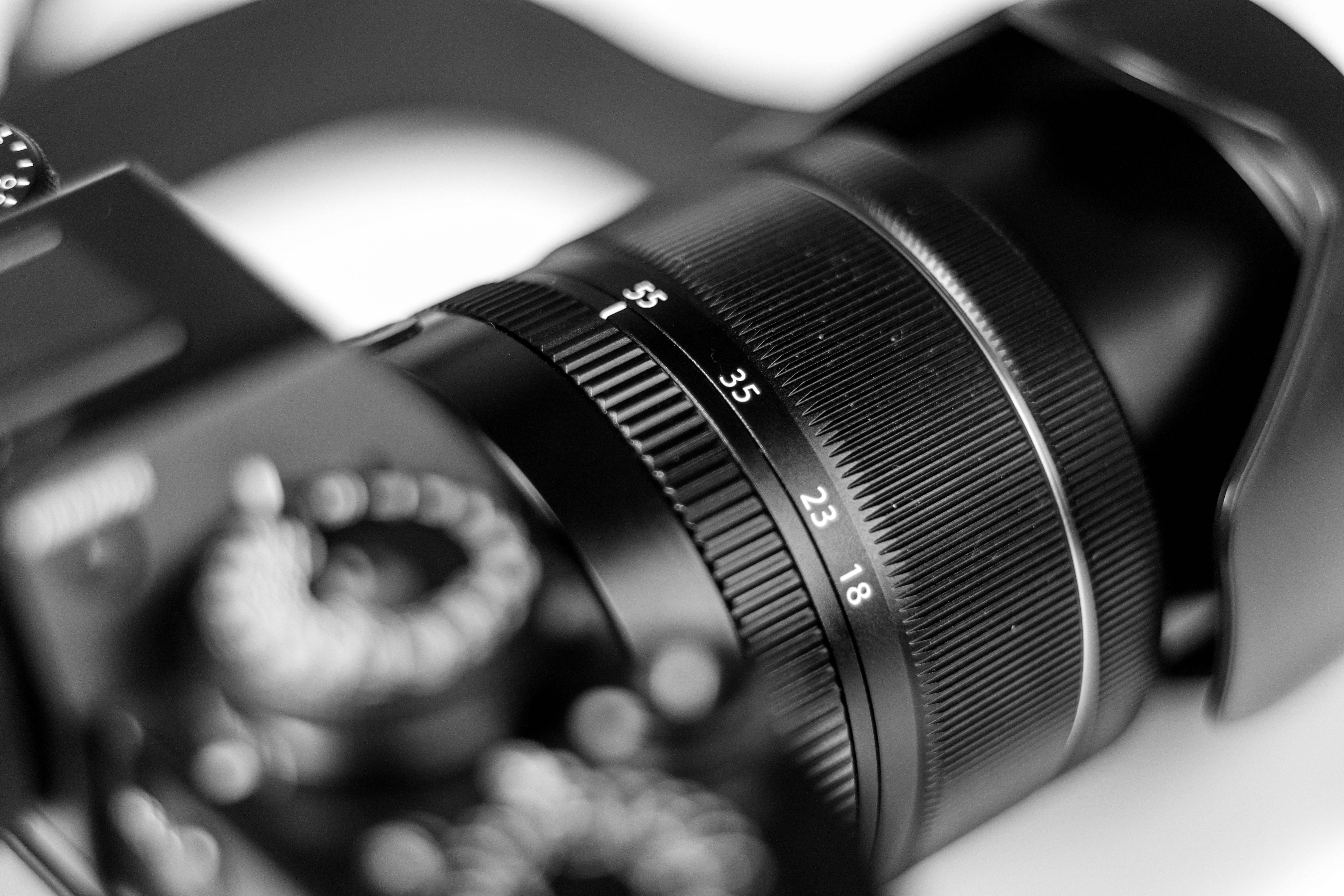 Close-up of Camera Lens with Focus Dial · Free Stock Photo