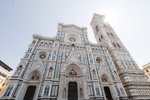 Stunning view of Florence Cathedral and Giotto's Bell Tower under a bright sky.