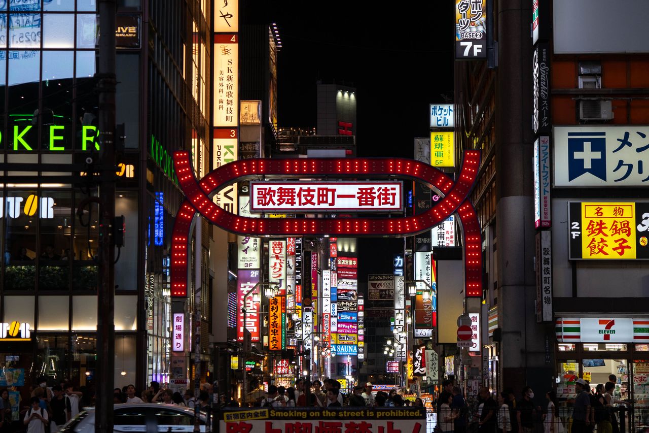 dazzling neon lights and bustling streets capture the essence of tokyo