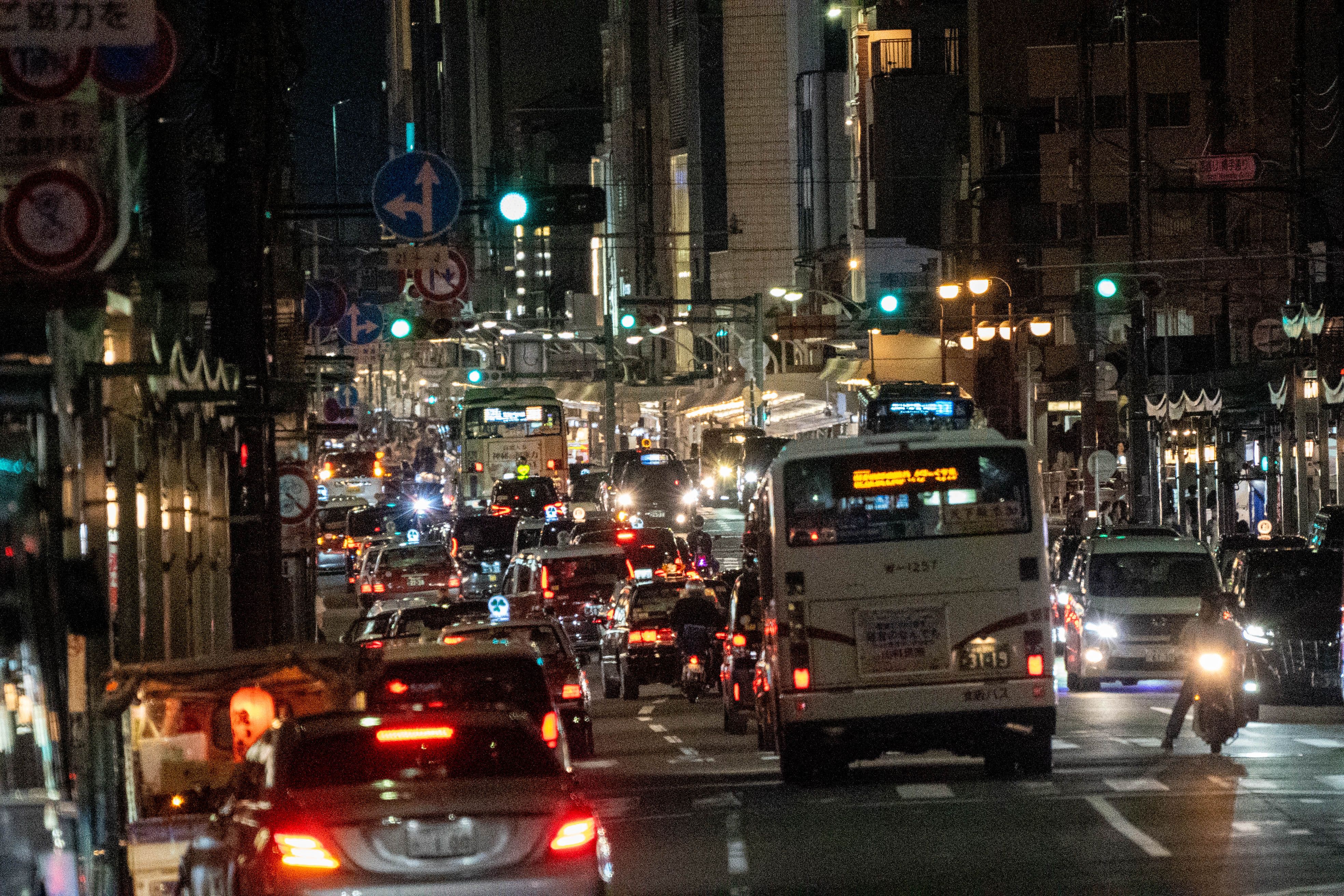 Busy Urban Street at Night with Traffic · Free Stock Photo
