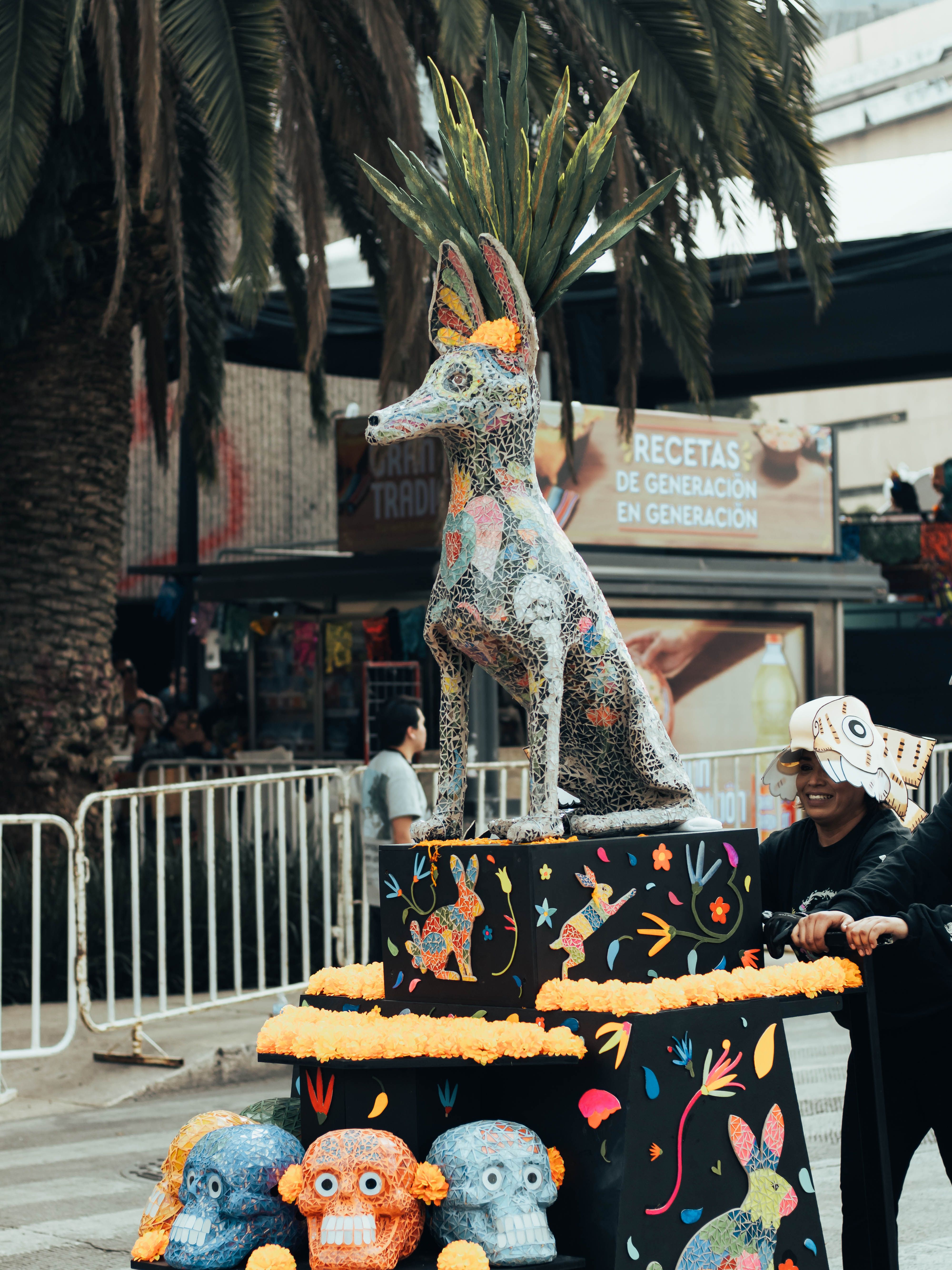 Vibrant alebrije sculpture at Day of the Dead parade, Mexico City.