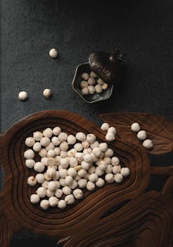 A flat lay of roasted chickpeas in a decorative wooden bowl, embodying Turkish cuisine.
