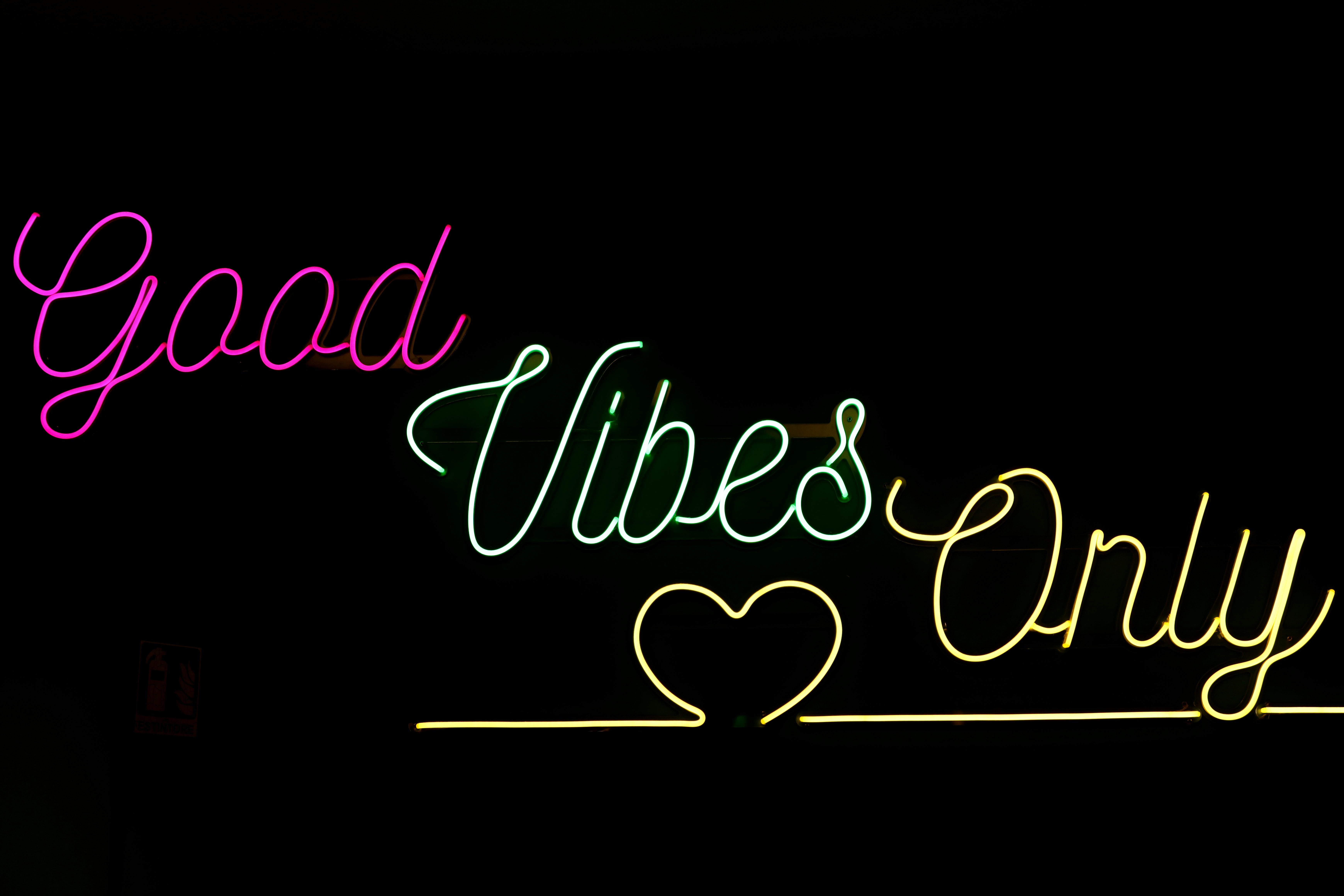 vibrant neon sign with positive message