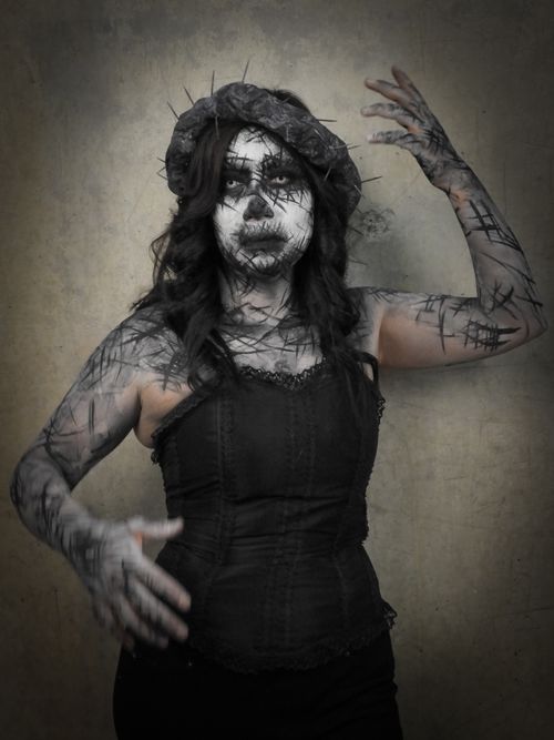 Free Spooky Halloween portrait with Gothic makeup and intricate costume in Mexico City. Stock Photo